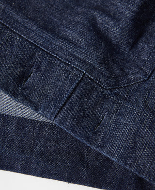 Indigo denim pullover jumper pocket seam and curved stitched edge detail