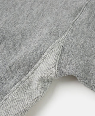 Heather gray sweatshirt sleeve with ribbed cuff and stitched seam