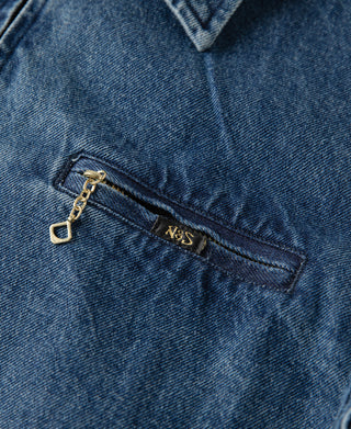 Stonewashed indigo denim work jacket front pocket zipper with pull tab