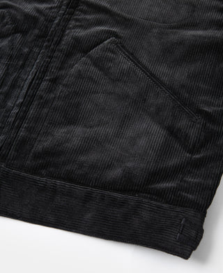 Black corduroy cossack jacket hem with stitched pocket seam