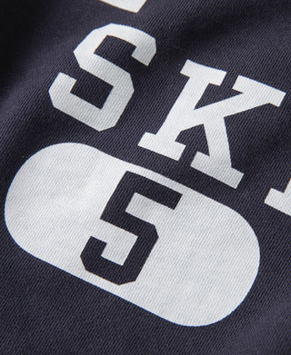 Navy ski sweater front graphic with large white “SKI 5” print