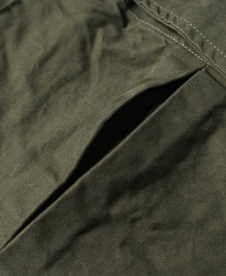 Olive fatigue jacket with inner seam and opening for pocket access