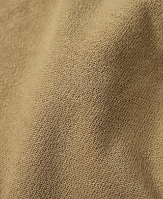 Close-up of khaki sweatshirt knit fabric texture