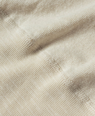 Beige woven henley fabric texture close-up