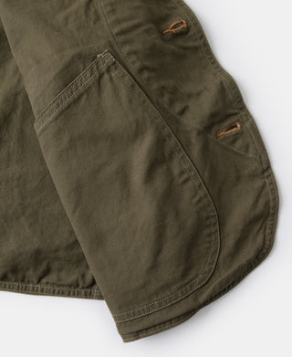 Dark olive canvas vest with angled patch pocket and button closure