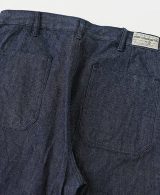 Indigo dungaree trousers with front pleats and two side pockets