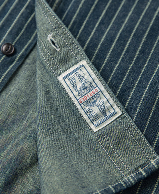 Inside placket label on indigo striped work shirt with numbered tag
