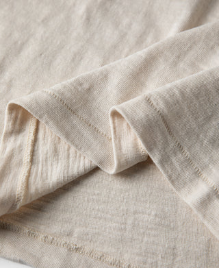 Loopwheel henley t-shirt sleeve hem with stitched edge in apricot-beige