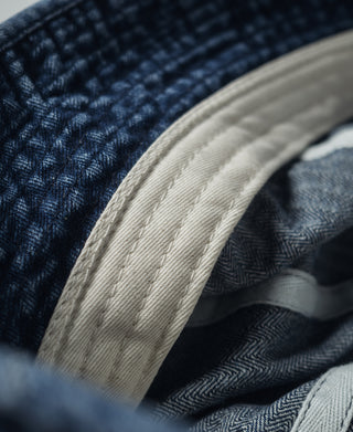 Indigo herringbone denim bucket hat interior band with woven lining
