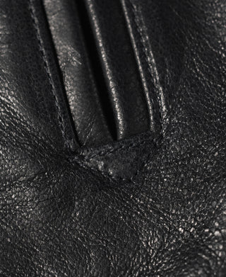 Black leather jacket sleeve cuff seam with reinforced edge stitching