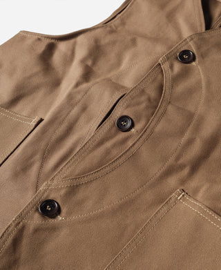 Khaki canvas hunting vest front with three black buttons and seams