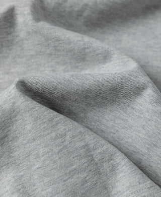Gray cotton jersey fabric texture on short-sleeve T-shirt