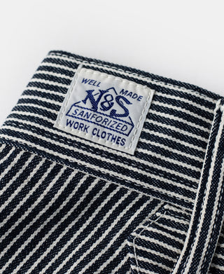 Striped carpenter pants inner waistband with N&S label and care text