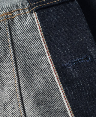 Indigo selvedge denim jacket interior with multicolor overlock edge stitching
