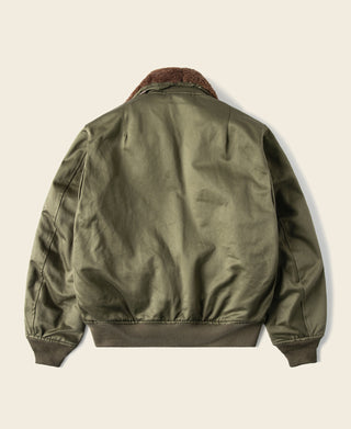 Olive flight jacket back view with knit cuffs and shearling-style fur collar
