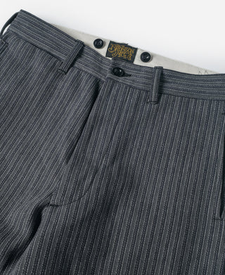 Black and gray striped pants with waistband, belt loops, and front closure