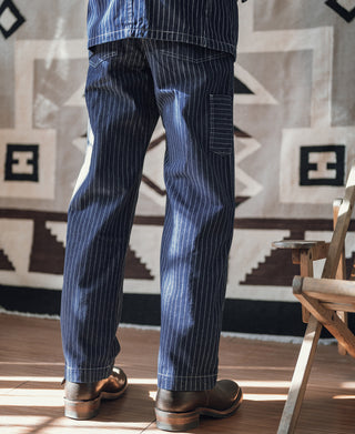 Indigo pinstriped work pants with flap side pocket and back yoke