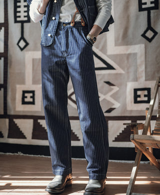 Indigo pinstriped work pants with tapered straight fit and ankle cuffs