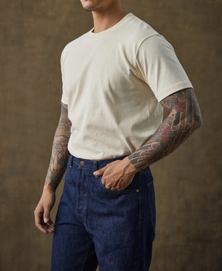 Off-white cotton crew-neck T-shirt on model, short sleeves