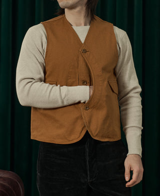 Ginger-brown canvas vest with V-neck and button front, flap chest pocket on right