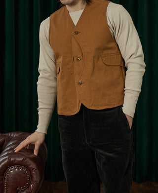 Ginger-brown canvas game vest with V-neck, four-button front, patch pockets at chest