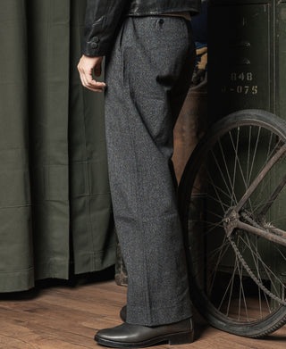 Salt and pepper trousers back view with pleats and tailored darting