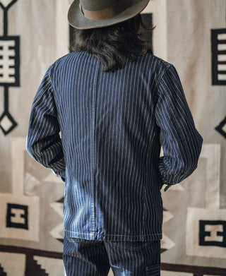 Indigo pinstripe work coat back view with buttoned yoke and long sleeves