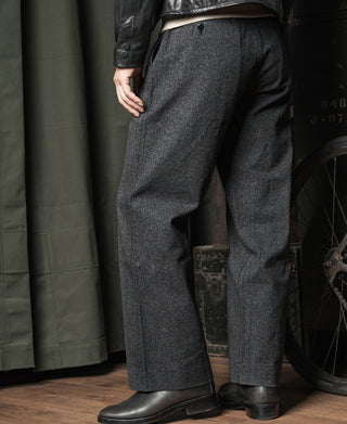 Salt and pepper trousers side view with crease line and mid-rise waistband