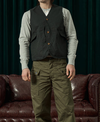 Dark green canvas game pockets vest with V-neck, four-button front