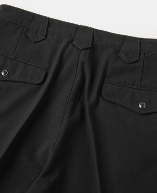 Black rockabilly trousers with flap hip pockets and snap buttons