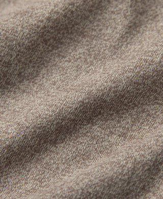 Heathered brown jersey knit fabric texture close-up