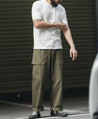 White short-sleeve henley T-shirt with button placket, worn by model