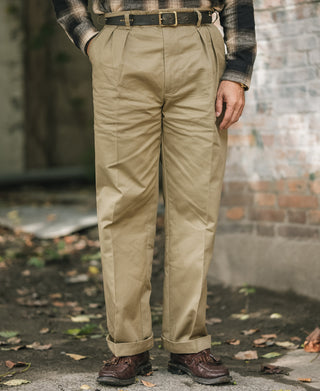 Khaki double-pleat cotton twill trousers on model, full front view