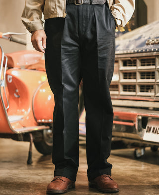 Black trousers with pleated front, relaxed straight-leg silhouette