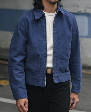 Blue cossack jacket zip-front with stand collar and flap pockets