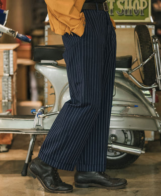 Navy pinstripe mechanic work pants with straight legs and belt loops