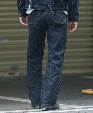 Indigo denim jeans with back yoke, belt loops, and buttoned rear pockets