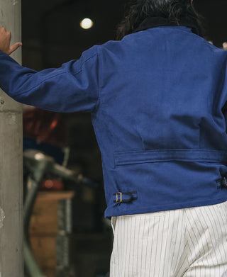 Blue moleskin cossack jacket back with stand collar and belt buckle strap