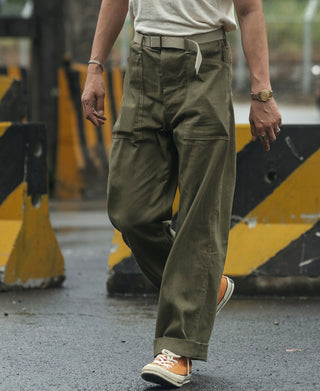 Olive utility fatigue trousers with belt loops and side pockets