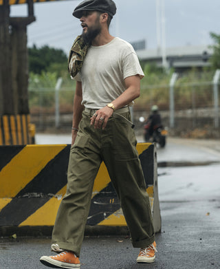 Olive utility fatigue trousers with cargo pocket and relaxed straight fit