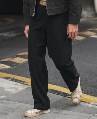 Black trousers front three-quarter view with relaxed straight-leg fit
