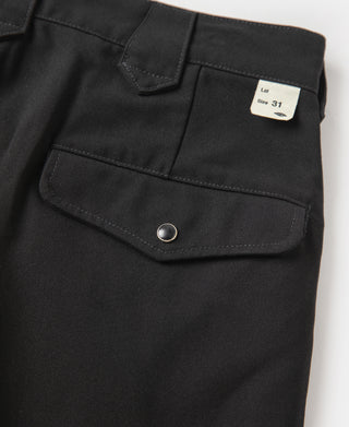 Black rockabilly style trousers with flap pocket and snap button front