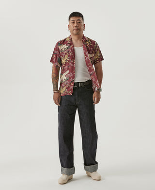 Men's wine red aloha shirt with tiger-and-crane print, paired with dark jeans