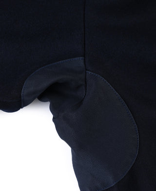 Navy deck hook jacket with curved pocket opening and ribbed cuff