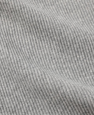 Close-up of gray ribbed knit fabric texture on cotton tank top