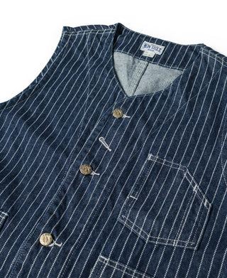 Indigo pinstripe work vest neckline with brass-toned buttons and chest flap pocket