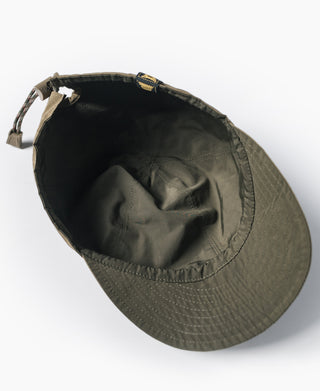 Reversible nylon cap interior with black lining and khaki outer brim