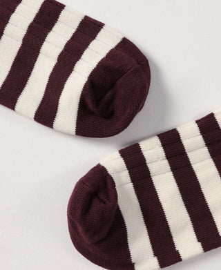 Red and white striped cotton socks, folded cuff and toe shown