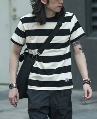 Black-and-white wide striped T-shirt with crew neck and short sleeves, front view