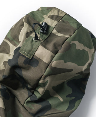 Woodland camo parka with snap-up hood and front drawstring toggles